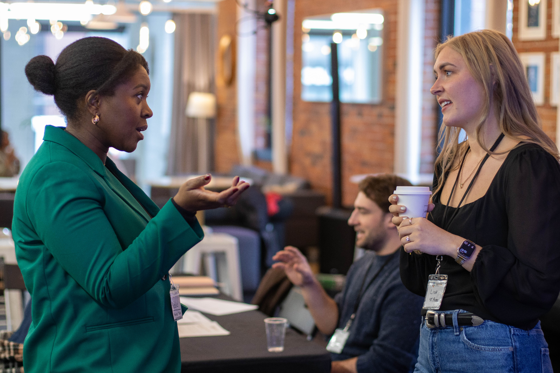 Operators connecting between sessions at the in-person gathering