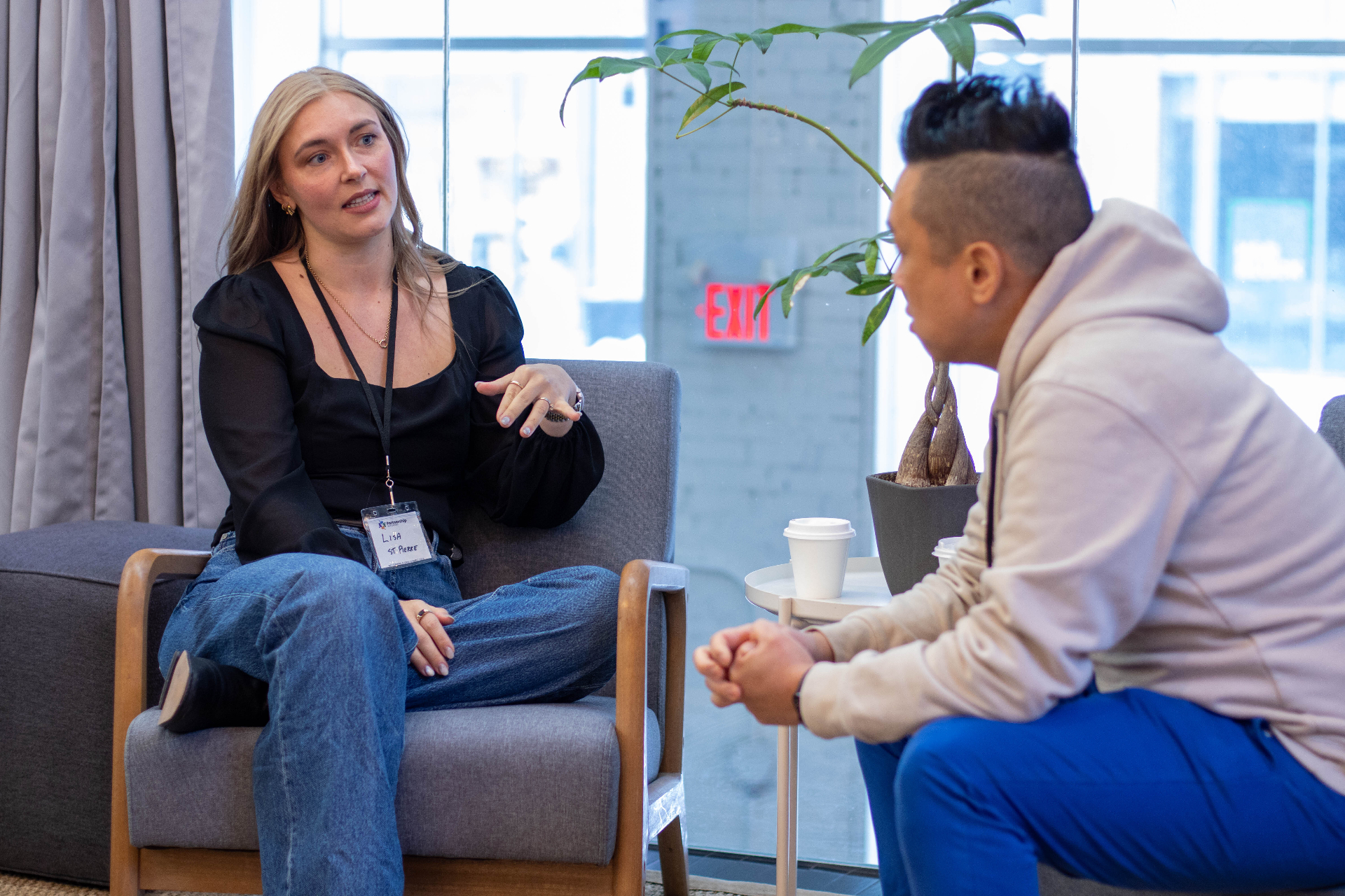 Member sharing a perspective during a lounge conversation